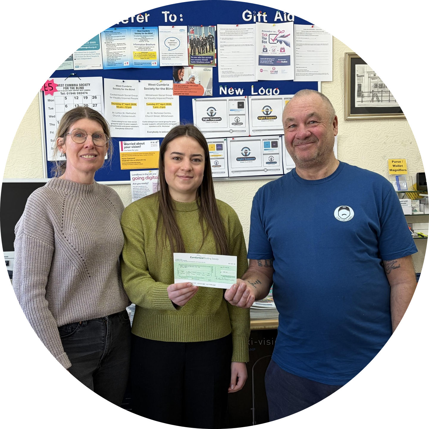 Mark Andrews from The Charlie and Kathleen Dunnery Children's Fund presenting a cheque  to Sight Support West Cumbria 